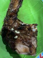 Grilled Fish on Green Plate photo