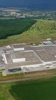 Aerial view of modern industrial complex. Vertical video