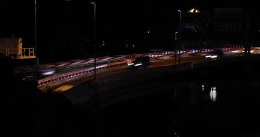 A night traffic jam on the city highway in Tokyo slow shutter shot video