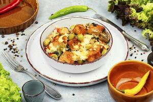 Turkey fillet with rice and cheese. photo