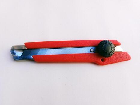 Close-up horizontal shot of the red cutter, shot from a high angle photo