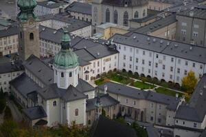 Panoramic view of the center of Salzburg old town with Saints Rupert and Vergilius cathedral close up from above photo