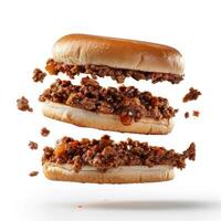 a couple of buns that have some meat on them photo