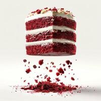 a slice of red velvet cake with white frosting photo
