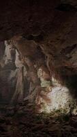 A cave filled with rocks and dirt video