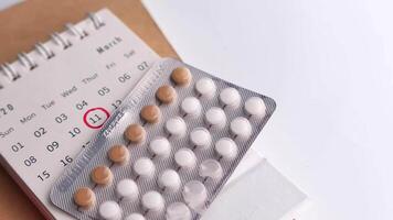 A calendar with pills and a calendar with pills video