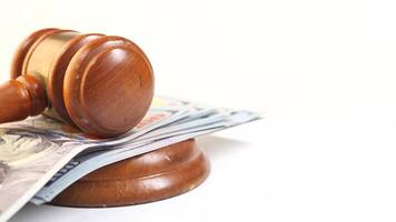 Judge's gavel and money on white background video