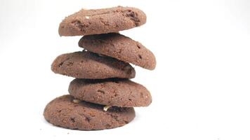 A stack of chocolate cookies on a white background video