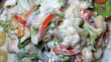 A plate of food with a sauce on it video