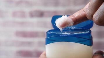 A person is holding a toothpaste container video