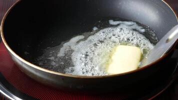 A pan with butter and a spatula video