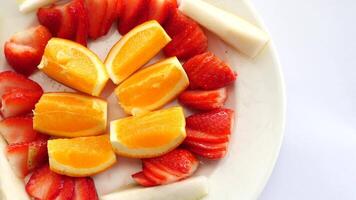 A plate of sliced fruit arranged in a circle video