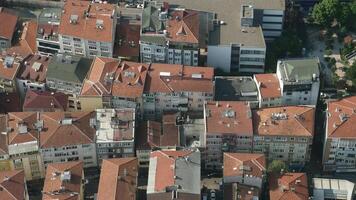 An Aerial View Capturing Urban Rooftops Adorned with Red Tiles and Varied Architecture video