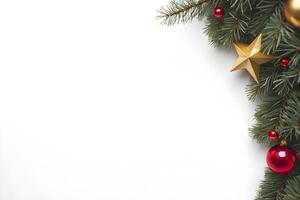 Top view layout with left blank space adorned pine tree branch decorative with shiny red and gold ball and star on white background like snow photo