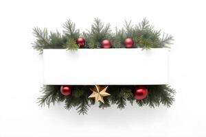 Top view layout with horizontal center blank space adorned pine tree branch, red ball, golden star in the box on white background photo