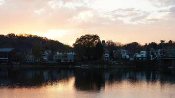 The beautiful sunset view with the colorful sky and river as background in a little USA town photo