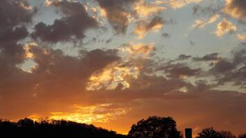 The beautiful sunset sky view with the colorful clouds as background photo