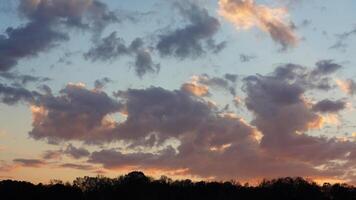 The beautiful sunset sky view with the colorful clouds as background photo