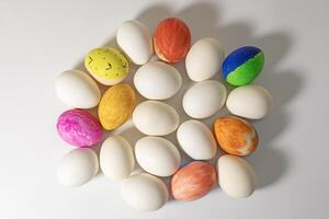 Colorful Easter eggs on white surface during Easter celebration. Happy easter. photo