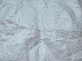 white sack texture and pattern. Arranged on a simple white background. For banners, website covers photo