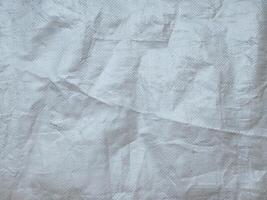 white sack texture and pattern. Arranged on a simple white background. For banners, website covers photo