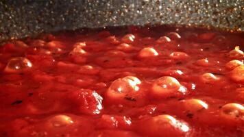 Tomato sauce in a frying pan. Filmed on a high-speed camera at 1000 fps. High quality FullHD footage video