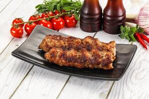 Chicken kebab minced meat and spices photo