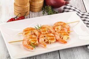 Grilled king prawn skewer snack photo