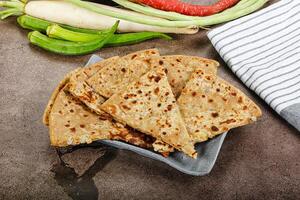 Indian Aloo Paratha - bread with potato photo