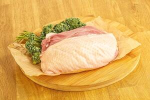Raw duck breast for cooking photo