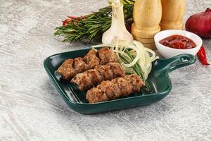 Beef kebab minced meat with onion photo