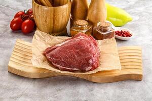 Raw beef piece for cooking photo