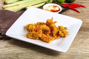 Golden deep prawn tempura wuth sauce photo