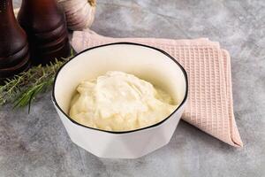 Italian soft young cheese stracciatella photo