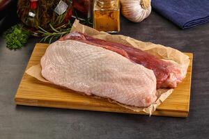 Raw duck breast for cooking photo