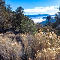Beautiful mountain scenery on the background of clouds, layers of mountains on the horizon, Sierra Nevada Mountains, California, USA photo