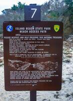 New Jersey, USA - November 19, 2009 information signs on coastal sand dunes, Island Beach State Park photo