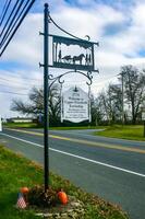 New Jersey, USA - November 19, 2009 sign near the road with a historical image of a horse with a cannon in the suburbs of New Jersey, USA photo