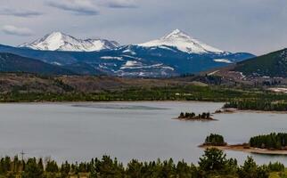 Snow-capped mountains in the background of a mountain lake in Utah, nature US photo