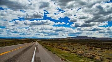 Rain clouds during the day over the plains in Utah, US photo