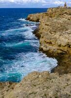 High steep stone coast during a storm in the Crimea, Tarkhankut photo