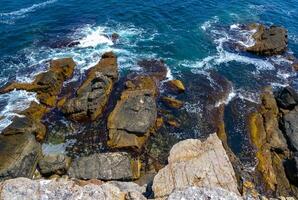 Coastal cliffs from the north side of Serpent's Zmeinyi Island, Ukraine photo