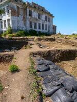 BULGARI, BLACK SEA - AUGUST 26, 2014 - abandoned knowledge of the maritime school near the shore of the Black Sea near Sozopol, Bulgaria photo