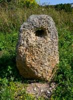 Ancient artifact, an ancient stone anchor, raised from the bottom of the Black Sea near Sozopol, Bulgaria photo