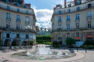 NANTES, FRANCE - SEPTEMBER 12, 2017 - Nantes - Place Graslin, fountain in the center of the square, France photo