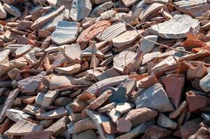 Pottery shards from excavations of an ancient city, archaeological site photo