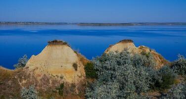 Clay Camel rocks on the bank of the Tiligul estuary photo