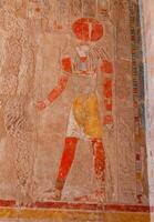 EGYPT, LUXOR - MARCH 01, 2019 archaeological site, drawings and geoglyphs on the walls of an ancient temple, the temple of Hatshepsut near Luxor in Egypt photo