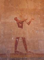 EGYPT, LUXOR - MARCH 01, 2019 archaeological site, drawings and geoglyphs on the walls of an ancient temple, the temple of Hatshepsut near Luxor in Egypt photo