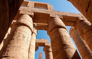 EGYPT, LUXOR - MARCH 01, 2019 ancient temple columns with hieroglyphs, drawings and inscriptions at Karnak in Luxor, Egypt photo